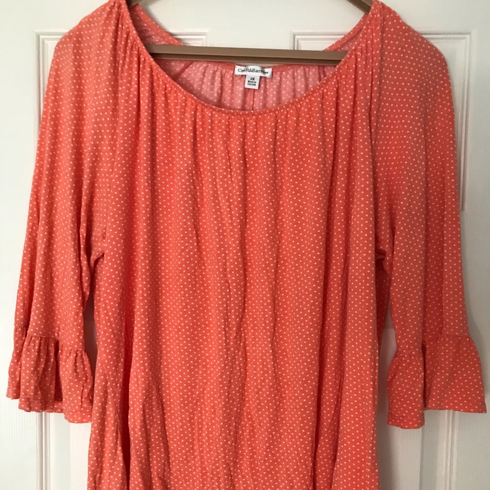 3/4 sleeve top with flared arm cuffs